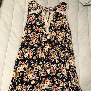 Navy blue floral dress. Large. Mid thigh to just above knees. Flowy.